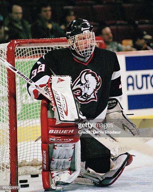 Goaltender Dominik Hasek of the Buffalo Sabres protects the net against the Montreal Canadiens in the 1990's at the Montreal Forum in Montreal,...