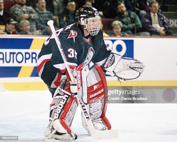 Goaltender Dominik Hasek of the Buffalo Sabres protects the net against the Montreal Canadiens in the 1990's at the Montreal Forum in Montreal,...