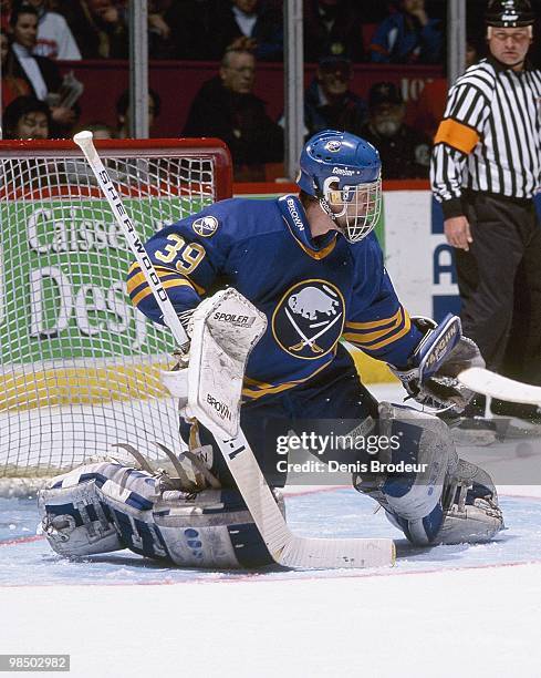 Goaltender Dominik Hasek of the Buffalo Sabres protects the net against the Montreal Canadiens in the 1990's at the Montreal Forum in Montreal,...