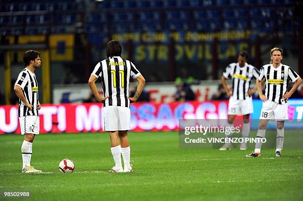 Juventus Brazilian forward Amauri Carvalho de Oliveira and Brazilian midfielder Diego react after Inter Milan's Cameroonian forward Samuel Eto'o...