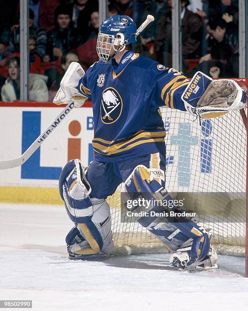 Goaltender Dominik Hasek of the Buffalo Sabres protects the net against the Montreal Canadiens in the 1990's at the Montreal Forum in Montreal,...