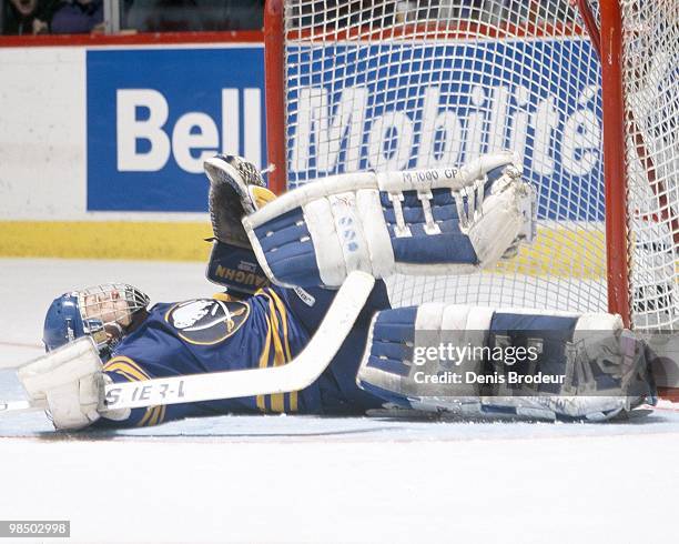 Goaltender Dominik Hasek of the Buffalo Sabres protects the net against the Montreal Canadiens in the 1990's at the Montreal Forum in Montreal,...