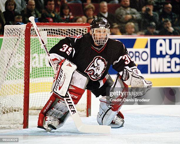 Goaltender Dominik Hasek of the Buffalo Sabres protects the net against the Montreal Canadiens in the 1990's at the Montreal Forum in Montreal,...