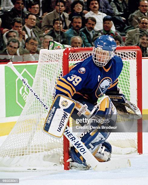 Goaltender Dominik Hasek of the Buffalo Sabres protects the net against the Montreal Canadiens in the 1990's at the Montreal Forum in Montreal,...