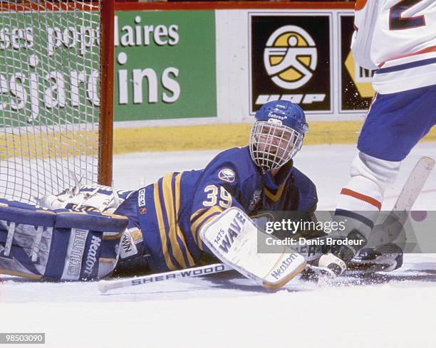 Goaltender Dominik Hasek of the Buffalo Sabres protects the net against the Montreal Canadiens in the 1990's at the Montreal Forum in Montreal,...