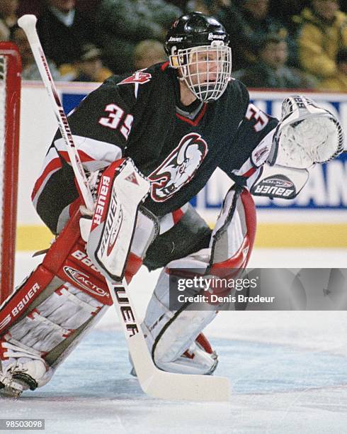 Goaltender Dominik Hasek of the Buffalo Sabres protects the net against the Montreal Canadiens in the 1990's at the Montreal Forum in Montreal,...