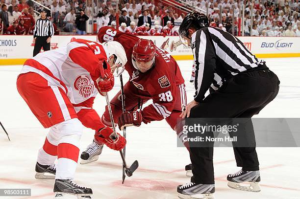 Pavel Datsyuk of the Detroit Red Wings wins a face off against Vernon Fiddler of the Phoenix Coyotes in Game One of the Western Conference...