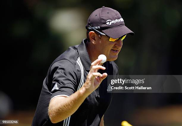 Greg Owen of England waves to the gallery after a birdie on the 13th hole during the second round of the Verizon Heritage at the Harbour Town Golf...