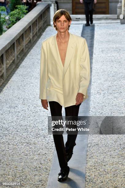 Model walks the runway during the Dunhill London Menswear Spring/Summer 2019 show as part of Paris Fashion Week on June 24, 2018 in Paris, France.