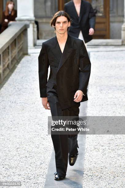 Model walks the runway during the Dunhill London Menswear Spring/Summer 2019 show as part of Paris Fashion Week on June 24, 2018 in Paris, France.