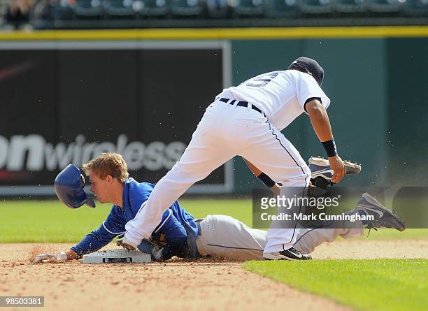 Chris Getz of the Kansas City Royals is out at second base as Ramon Santiago of the Detroit Tigers applies the tag during the game at Comerica Park...