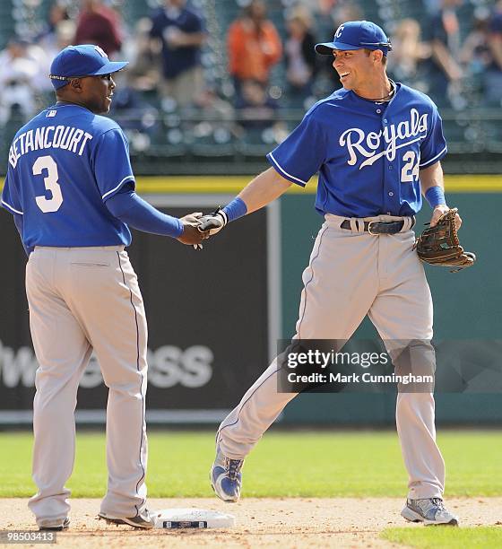 Yuniesky Betancourt and Rick Ankiel of the Kansas City Royals shake hands after the victory against the Detroit Tigers at Comerica Park on April 14,...