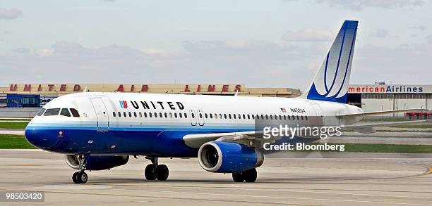 United Airlines Airbus A320 jet arrives at O'Hare International Airport in Chicago, Illinois, U.S., on Friday, April 16, 2010. A merger between UAL...