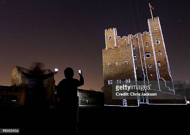 Rochester Castle is illuminated by a 3D animation lightshow on April 16, 2010 in Rochester, England. Images of rock band AC/DC and images from Iron...