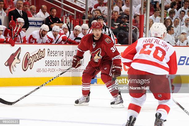 Vernon Fiddler of the Phoenix Coyotes skates backwards up ice while watching the puck against the Detroit Red Wings in Game One of the Western...