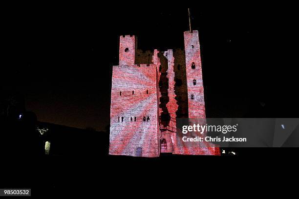 Rochester Castle is illuminated by a 3D animation lightshow on April 16, 2010 in Rochester, England. Images of rock band AC/DC and images from Iron...