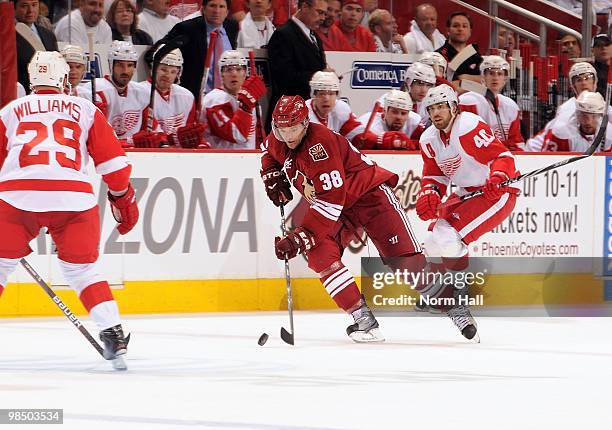 Vernon Fiddler of the Phoenix Coyotes skates the puck up ice against the Detroit Red Wings in Game One of the Western Conference Quarterfinals during...