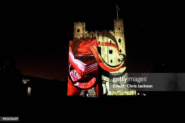 Rochester Castle is illuminated by a 3D animation lightshow on April 16, 2010 in Rochester, England. Images of rock band AC/DC and images from Iron...