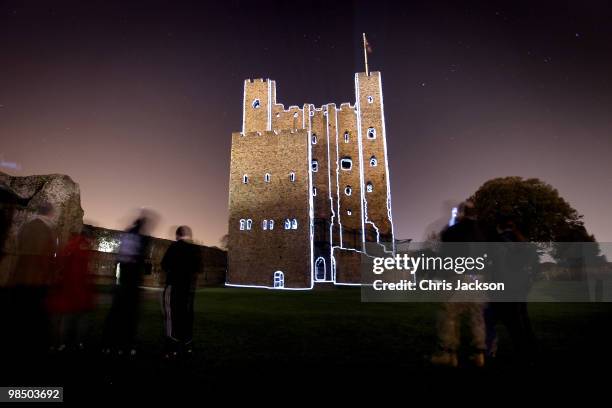 Rochester Castle is illuminated by a 3D animation lightshow on April 16, 2010 in Rochester, England. Images of rock band AC/DC and images from Iron...