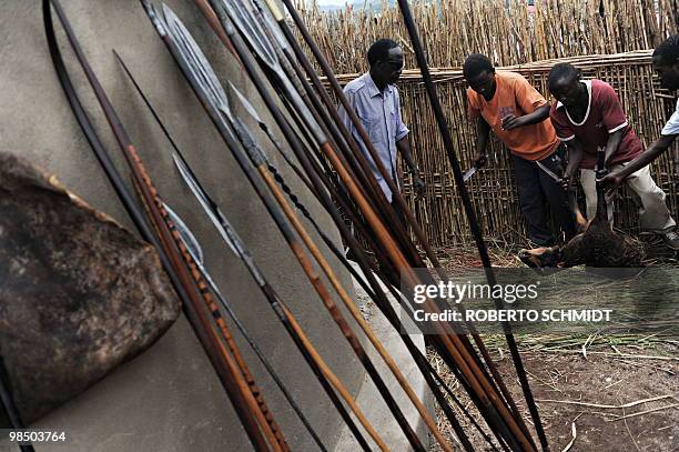 Members of a Toroo delegation sacrifice a goat during a ceremony in honor of King Oyo Nyimba Kabamba Iguru Rukidi IV in the western Ugandan town of...