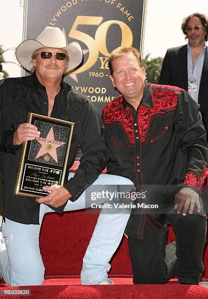 Country singer Alan Jackson and KKGO Radio Personality Shawn Parr attend the Alan Jackson Hollywood Walk Of Fame Induction Ceremony on April 16, 2010...