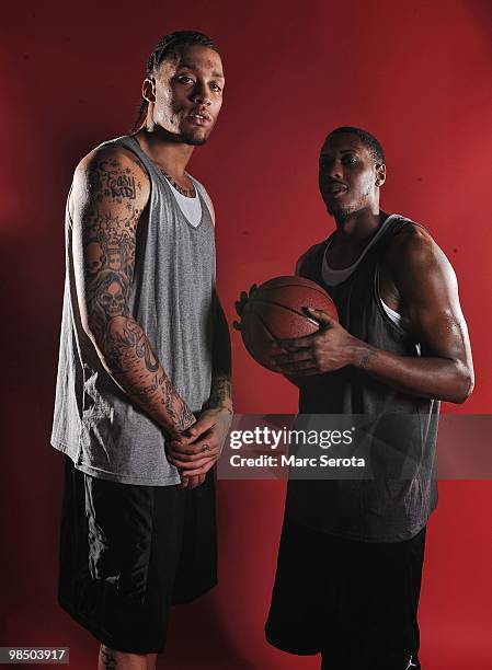 Forward Michael Beasley and guard Mario Chalmers of the Miami Heat pose during a photo shoot on April 12, 2010 in Ft. Lauderdale, Florida .