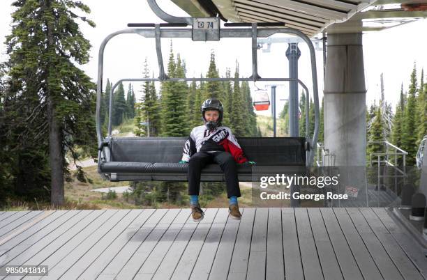 Mountain bikers hit the top of Whitefish Mountain Ski Resort, a popular mountain biking area during the summer, on June 22 in Whitefish, Montana....