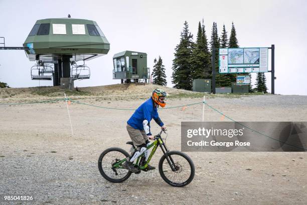 Mountain bikers hit the top of Whitefish Mountain Ski Resort, a popular mountain biking area during the summer, on June 22 in Whitefish, Montana....