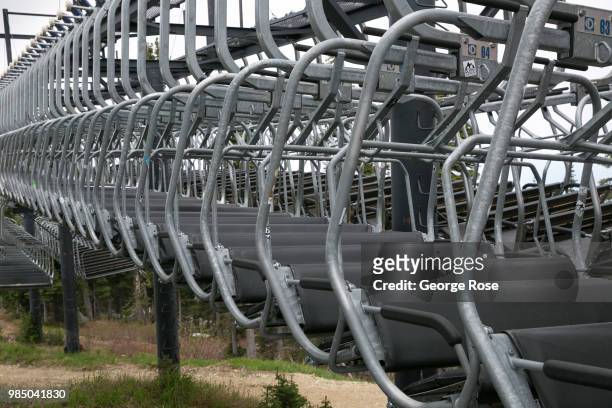 Chair lifts at Whitefish Mountain Ski Resort, a popular mountain biking area during the summer, are stored on June 22 in Whitefish, Montana. Home to...