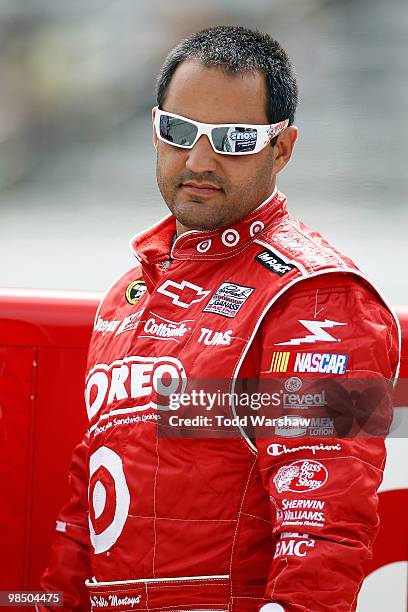 Juan Pablo Montoya, driver of the Target Chevrolet, stands on the grid during qualifying for the NASCAR Sprint Cup Series Samsung Mobile 500 at Texas...
