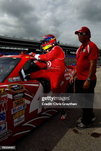 Juan Pablo Montoya, driver of the Target Chevrolet, gets out of his car after qualifying for the NASCAR Sprint Cup Series Samsung Mobile 500 at Texas...