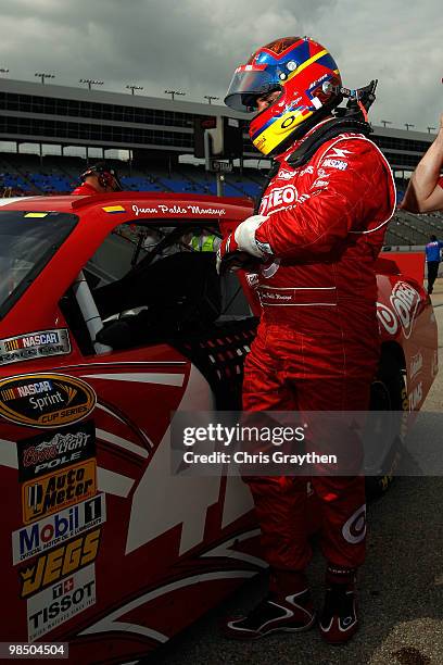 Juan Pablo Montoya, driver of the Target Chevrolet, gets out of his car after qualifying for the NASCAR Sprint Cup Series Samsung Mobile 500 at Texas...