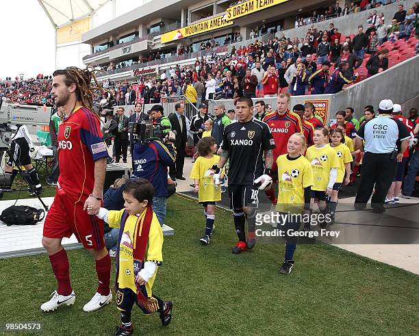 Kyle Beckerman of Real Salt Lake leads his teammates onto the field before their MLS match against Seattle Sounders FC at Rio Tinto Stadium on April...