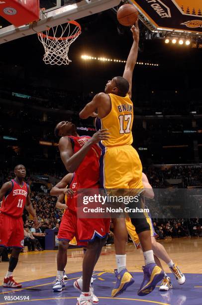 Andrew Bynum of the Los Angeles Lakers goes up with the ball against Samuel Dalembert of the Philadelphia 76ers during the game on February 26, 2010...