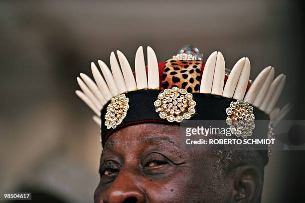An unidentified Nigerian King wears a ceremonial crown as he attends a ceremony in the western Ugandan town of Fort Portal to celebrate King Oyo...