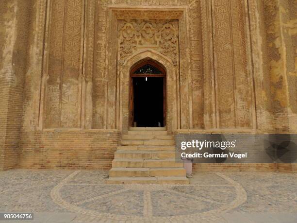 mysterious entrance gate to ancient mausoleum - alaviyan dome, hamedan - hamadan fotografías e imágenes de stock