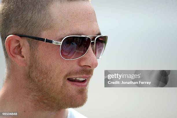 Scott Speed, driver of the Red Bull Toyota, stands on the grid during qualifying for the NASCAR Sprint Cup Series Samsung Mobile 500 at Texas Motor...