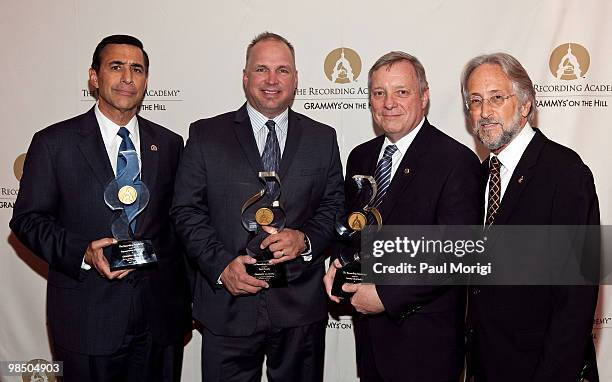 Honoree Rep. Darryl Issa, honoree Garth Brooks, honoree Sen. Dick Durbin and Neil Portnow, Recording Academy Preseident and CEO, at the GRAMMYs on...