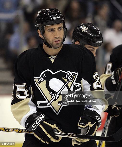 Maxime Talbot of the Pittsburgh Penguins prepares for a face-off against the New York Islanders at Mellon Arena on April 8, 2010 in Pittsburgh,...