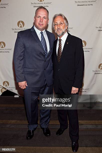 Honoree Garth Brooks and Neil Portnow, Recording Academy President and CEO, pose for a photo at the GRAMMYs on the Hill awards at The Liaison Capitol...