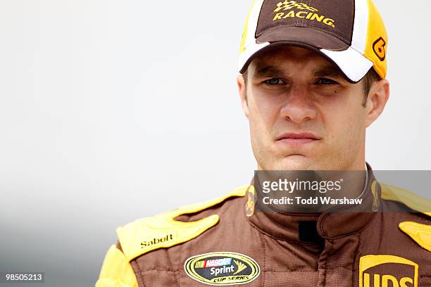 David Ragan, driver of the UPS Ford, stands on the grid during qualifying for the NASCAR Sprint Cup Series Samsung Mobile 500 at Texas Motor Speedway...