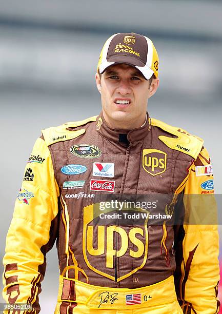 David Ragan, driver of the UPS Ford, stands on the grid during qualifying for the NASCAR Sprint Cup Series Samsung Mobile 500 at Texas Motor Speedway...