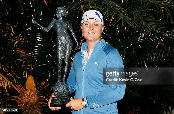 Anna Nordqvist of Sweden poses with the "Goddess the Fairway" trophy after winning The Mojo 6 Jamaica LPGA Invitational at Cinnamon Hill Golf Course...