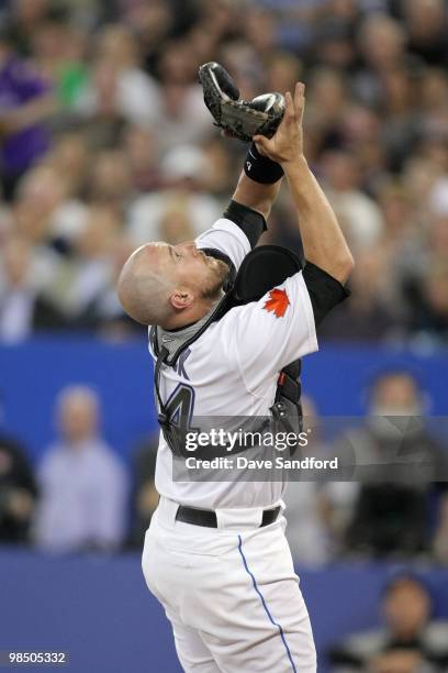 John Buck of the Toronto Blue Jays catches the pop up during the game against the Chicago White Sox at the Rogers Centre on April 12, 2010 in...