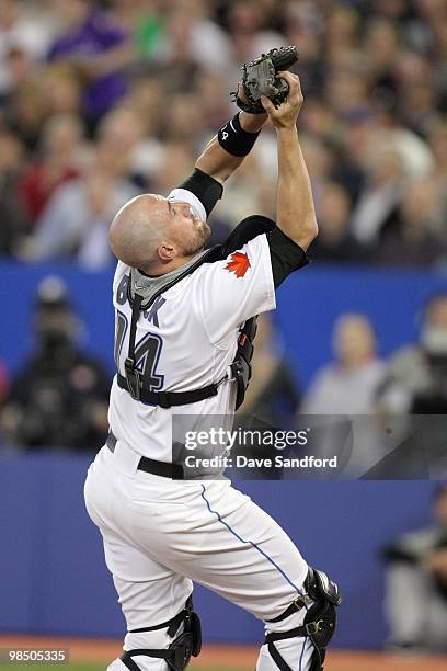 John Buck of the Toronto Blue Jays catches the pop up during the game against the Chicago White Sox at the Rogers Centre on April 12, 2010 in...