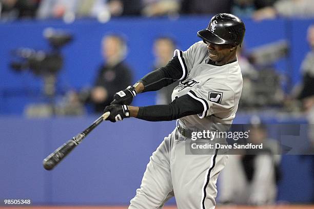 Juan Pierre of the Chicago White Sox swings at the pitch against the Toronto Blue Jays during their MLB game at the Rogers Centre on April 12, 2010...