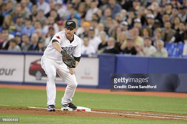 Lyle Overbay of the Toronto Blue Jays makes a the catch at first base during the game against the Chicago White Sox at the Rogers Centre on April 12,...
