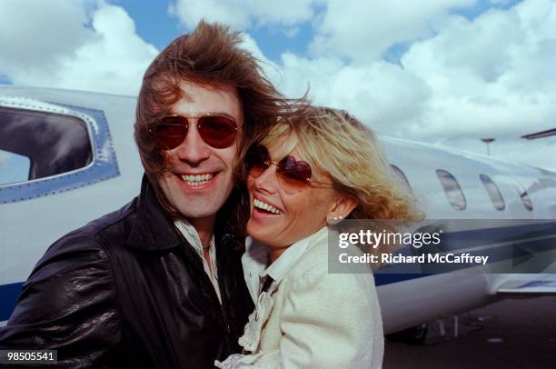 Roger Earl of Foghat and Britt Ekland pose for a portrait at the San Fransicso Airport in 1978 in San Francisco, California.
