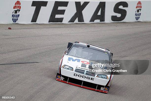 Sam Hornish Jr., driver of the Mobil 1 Dodge, drives on track during practice for the NASCAR Sprint Cup Series Samsung Mobile 500 at Texas Motor...