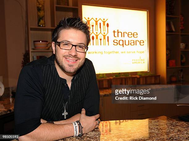Former American Idol Danny Gokey volunteers ar part of The American Idol Gives Back Program at The Three Square Food Bank on April 16, 2010 in Las...